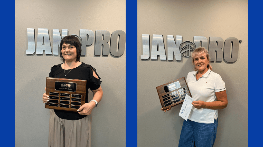Jan-Pro franchise owners holding perpetual plaque awards at Spokane Valley office